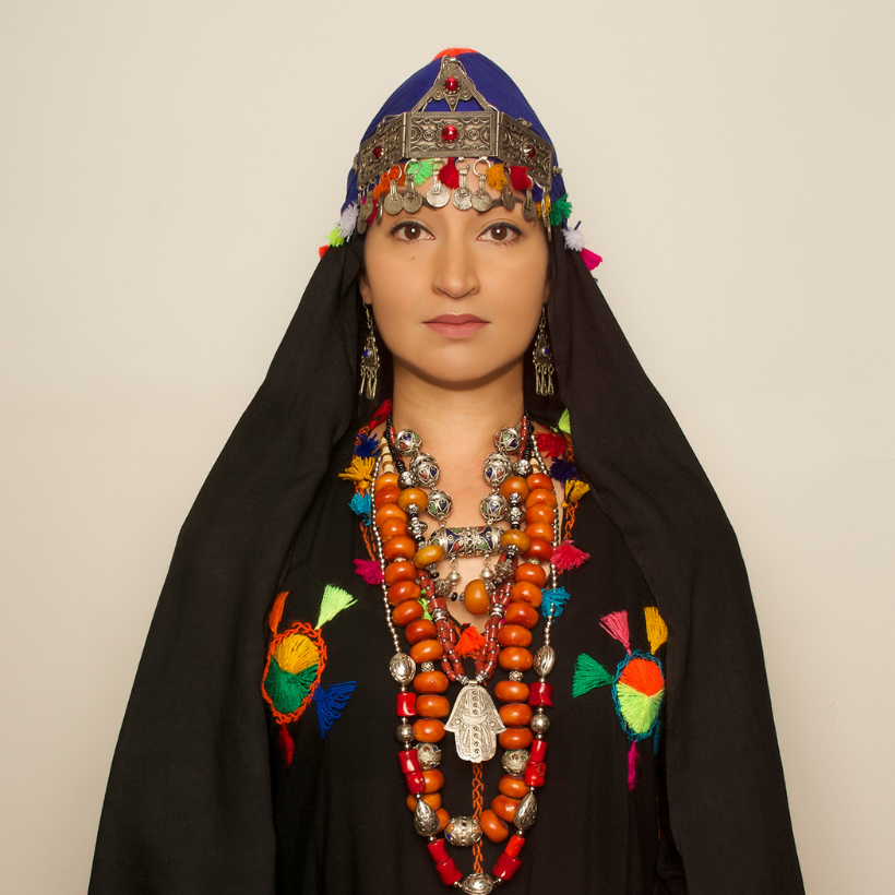 Moroccan-Woman. Photograph of the artist posing in traditional Moroccan clothing from the INTERCULTURAL exhibit.